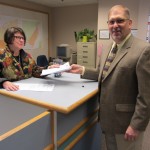 Tim Pearson, of the One Anchorage Campaign, files the Anchorage Equal Rights Initiative Application with Barbara Gruenstein, Municipal Clerk